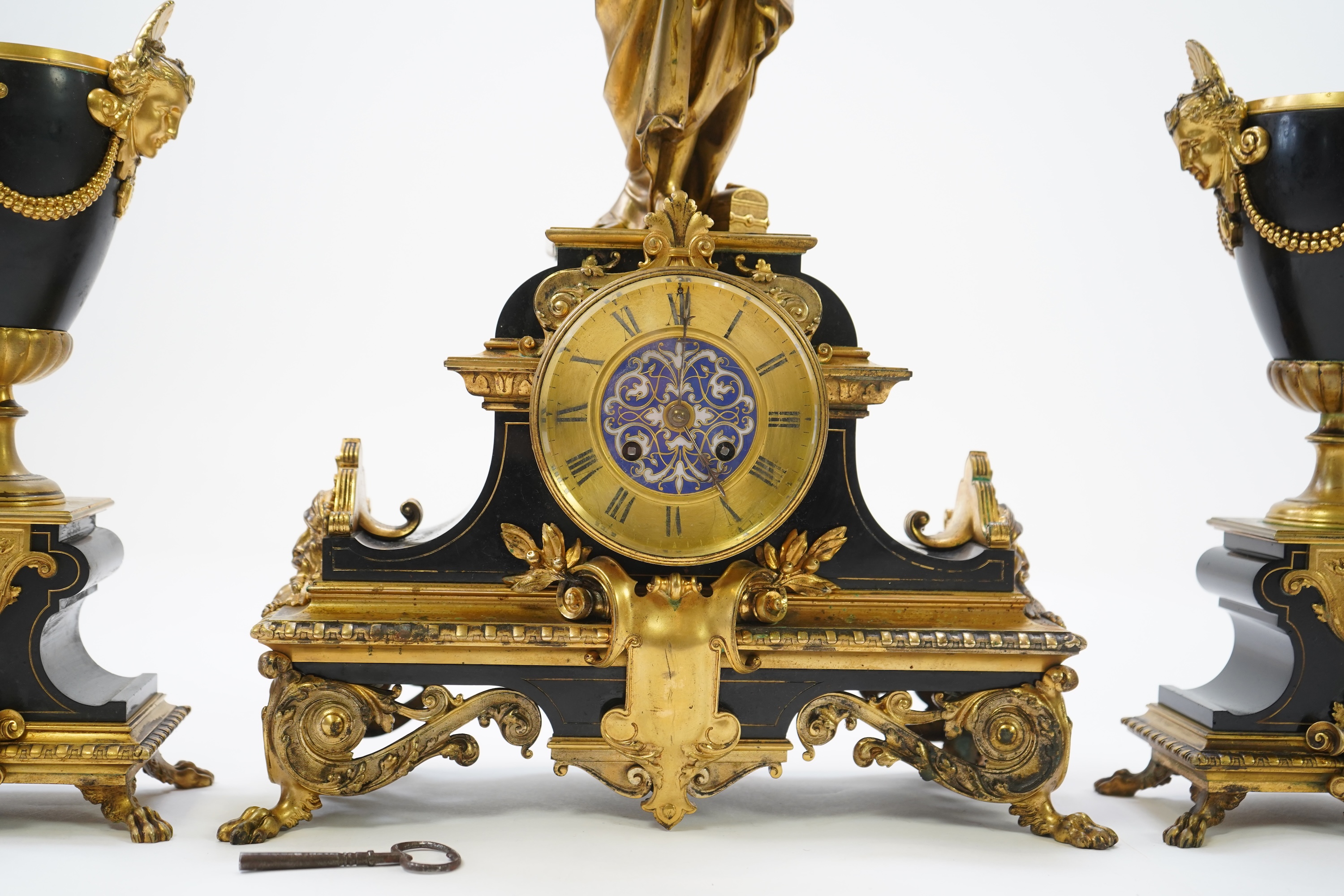 A French gilt bronze figural clock garniture, late 19th century